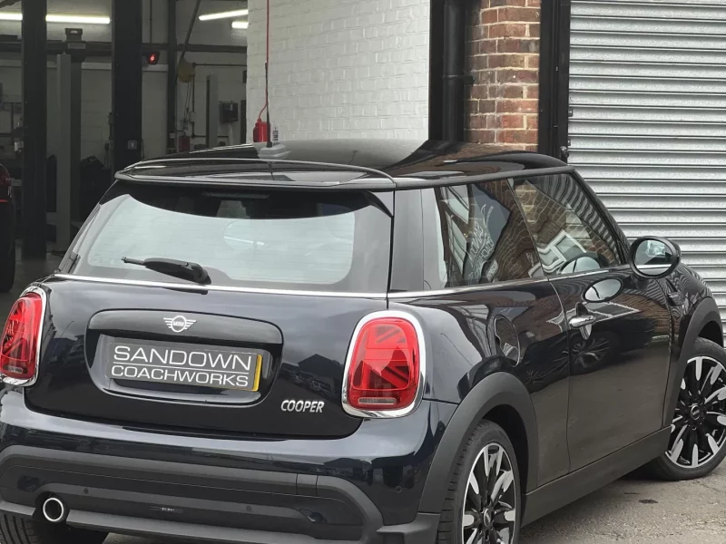 The finished repair project parked at the Sandown Coachworks reception, showing a high-gloss finish and perfect panel alignment.