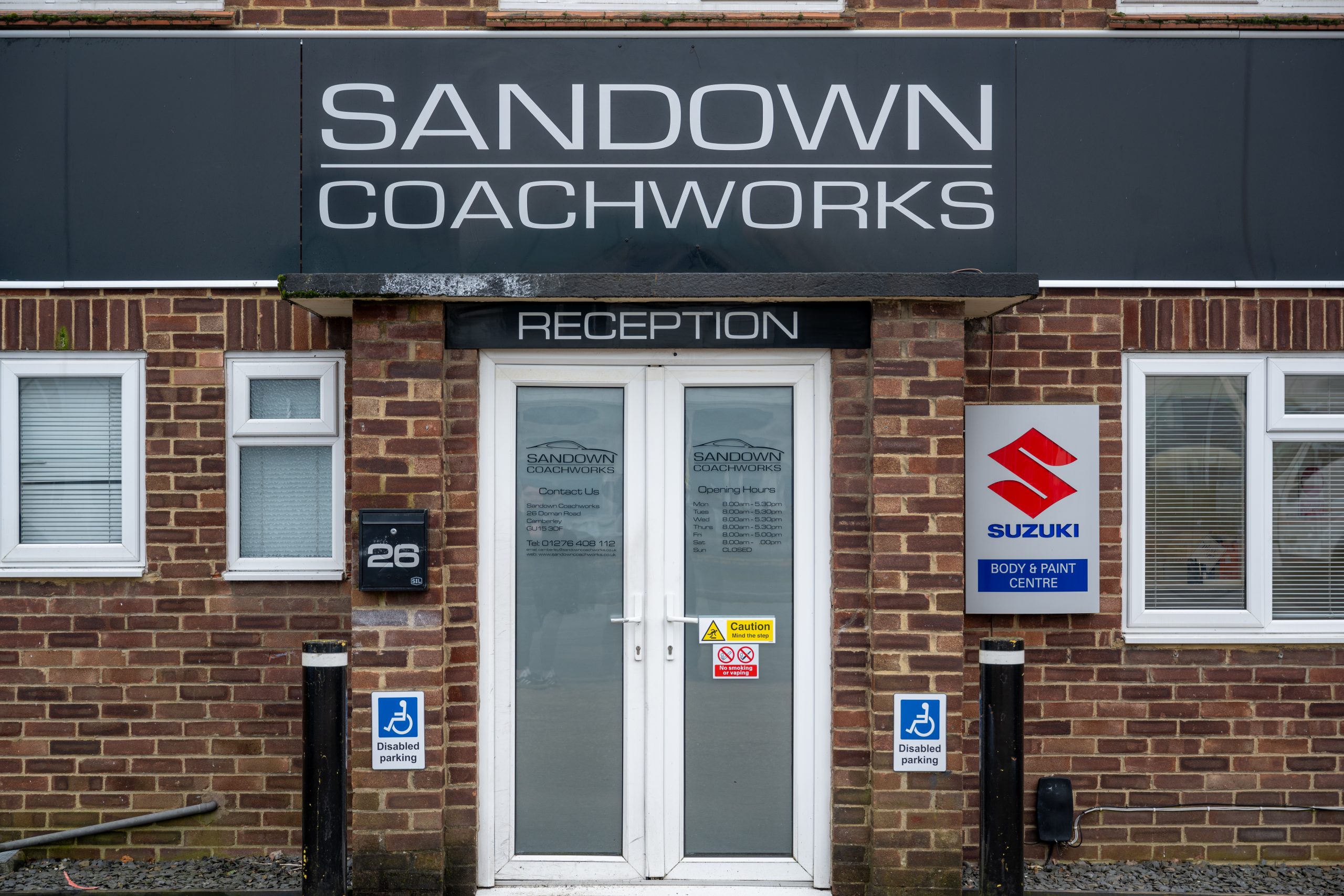 Exterior view of Sandown Coachworks reception and official Suzuki Body and Paint Centre entrance.
